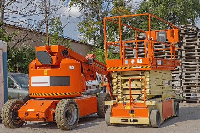 worker using forklift to transport goods in warehouse in Albany CA